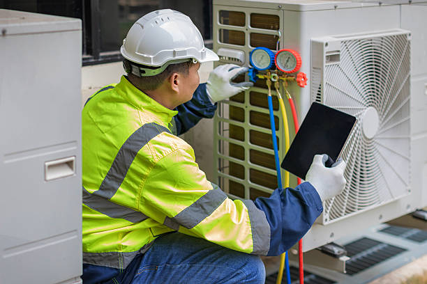 Professional Hvac technician working in Laton, CA